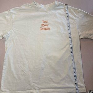 American Eagle Outfitters “Merry Mustang”  Cream and Red Boxy Fit  Graphic Tee